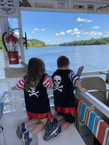 two children look out over the water