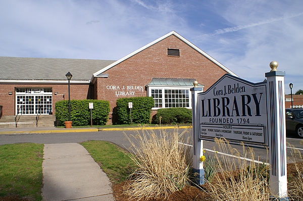 What is the impact of the 25/26 budget on the Rocky Hill Library?