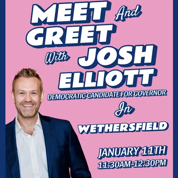 a man smiles at the camera